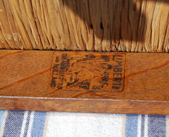 Charles Limbert's branded signature on the inside of the seat rail.